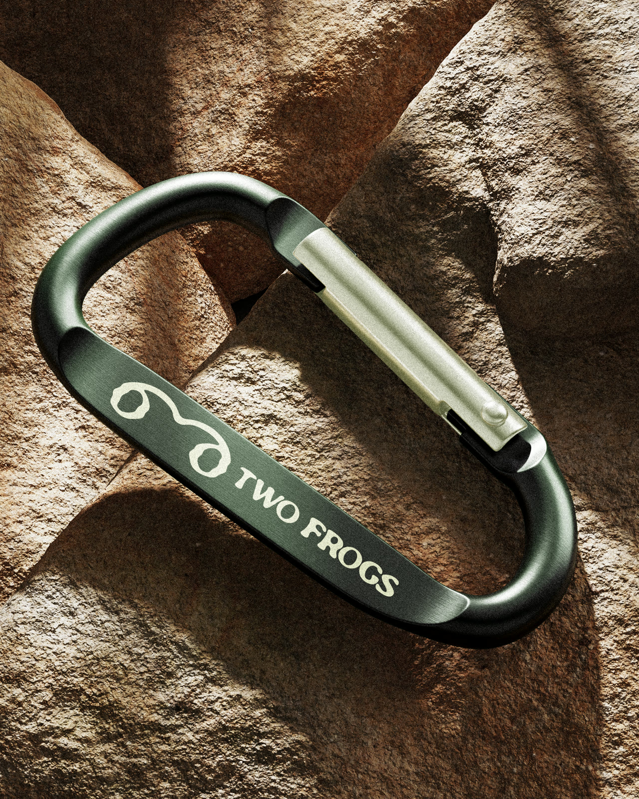 Two Frogs carabiner keeper on rock