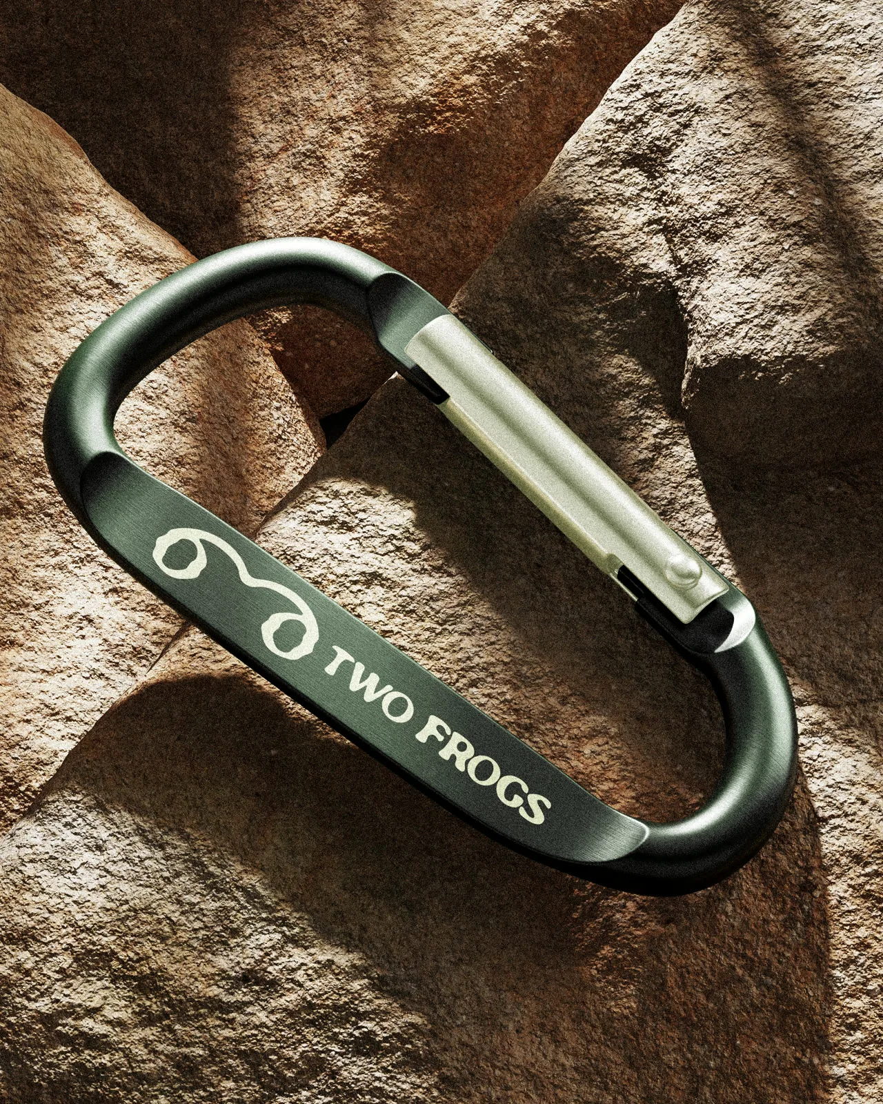 Two Frogs carabiner keeper on rock